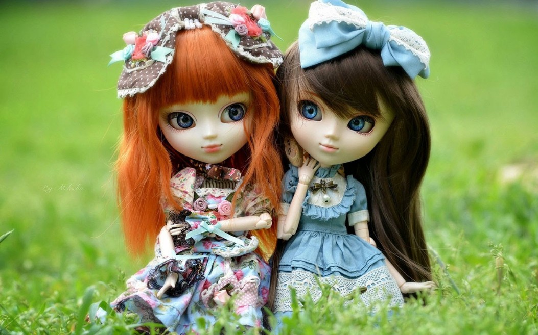 lovely siblings barbie doll in garden