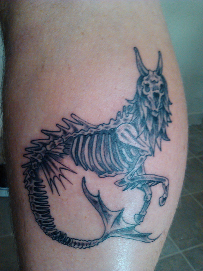 skeleton capricorn tattoo