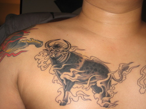 bull tattoo on chest