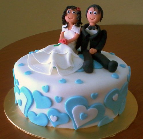 anniversary cake with animated couple
