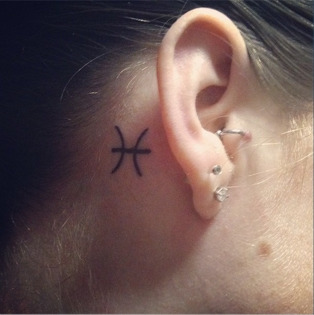 pisces tattoo design behind ear
