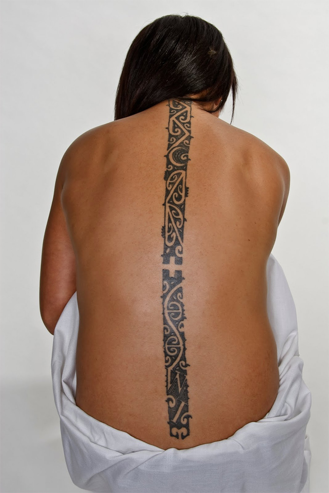fine line on back maori tattoo