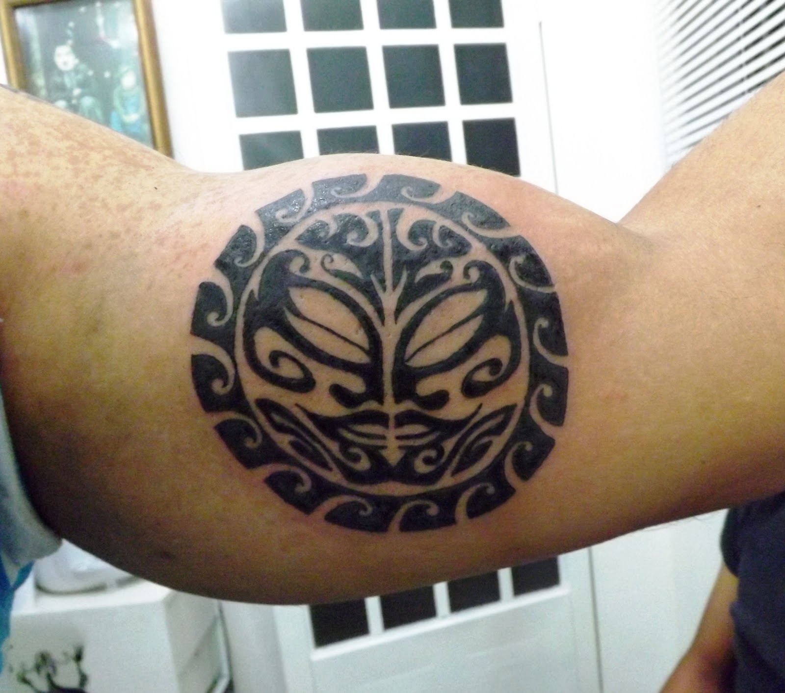 sun maori tattoo
