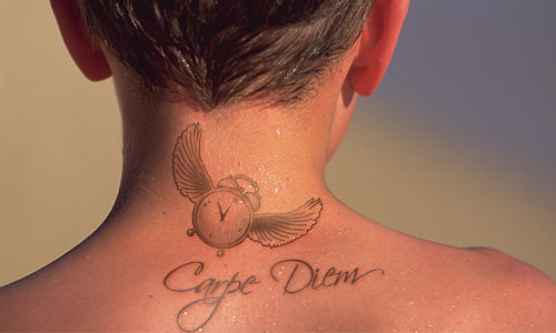 carpe diem tattoo with flying clock