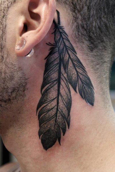 ear behing maori tattoo